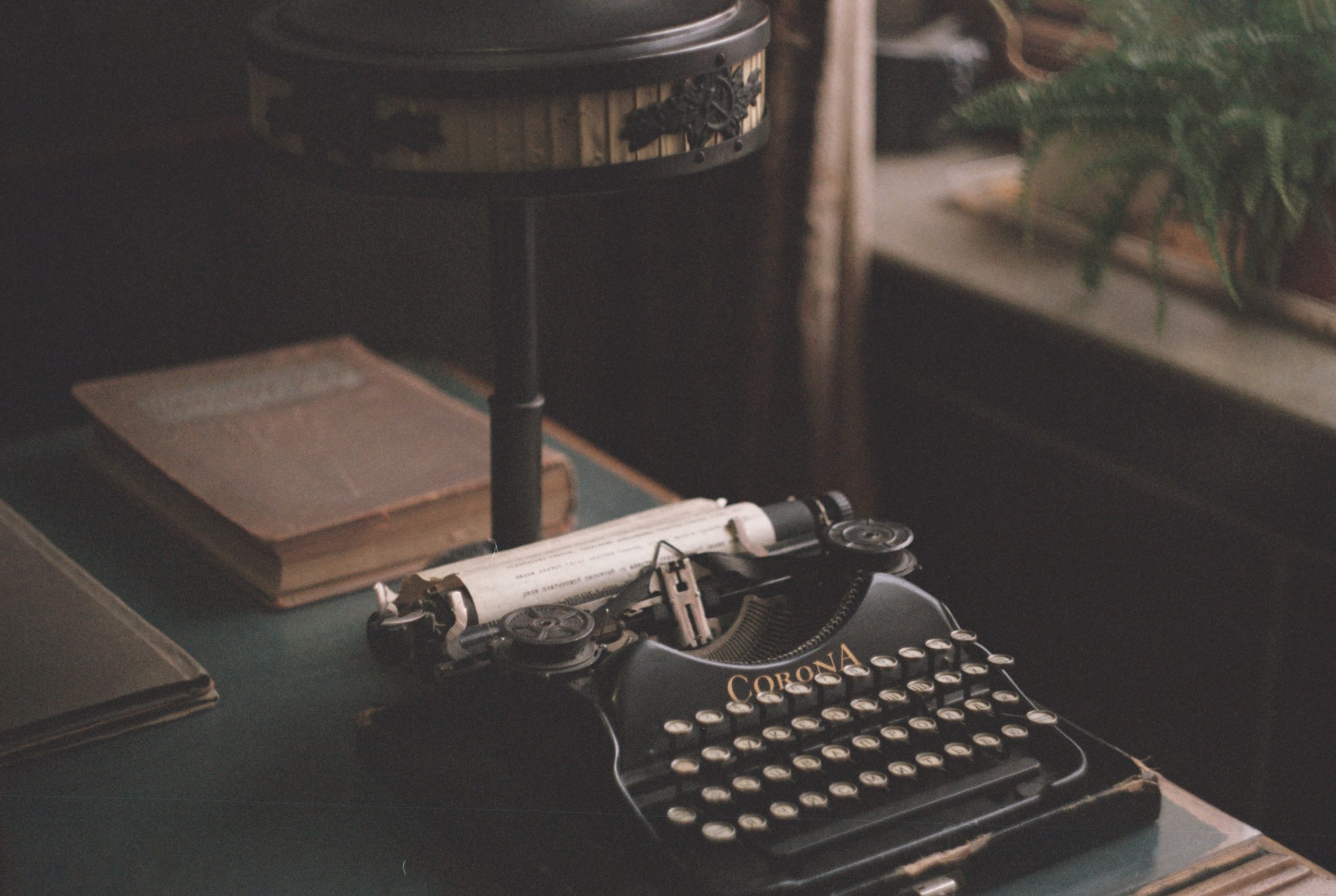 black typewriter on desk
