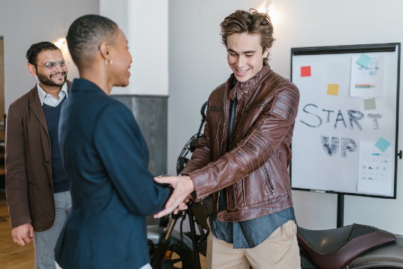 Investor and entrepreneur shaking hands